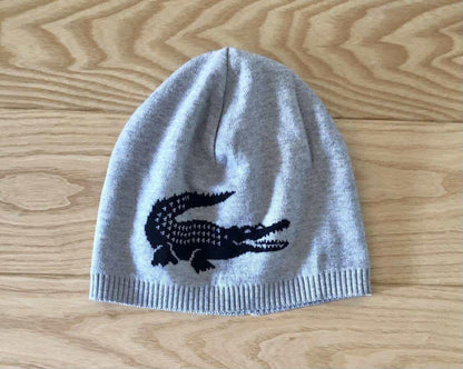 ШАПКА  ДВУЛИЦЕВА LACOSTE